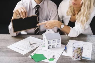 woman-pointing-chalkboard-estate-agency
